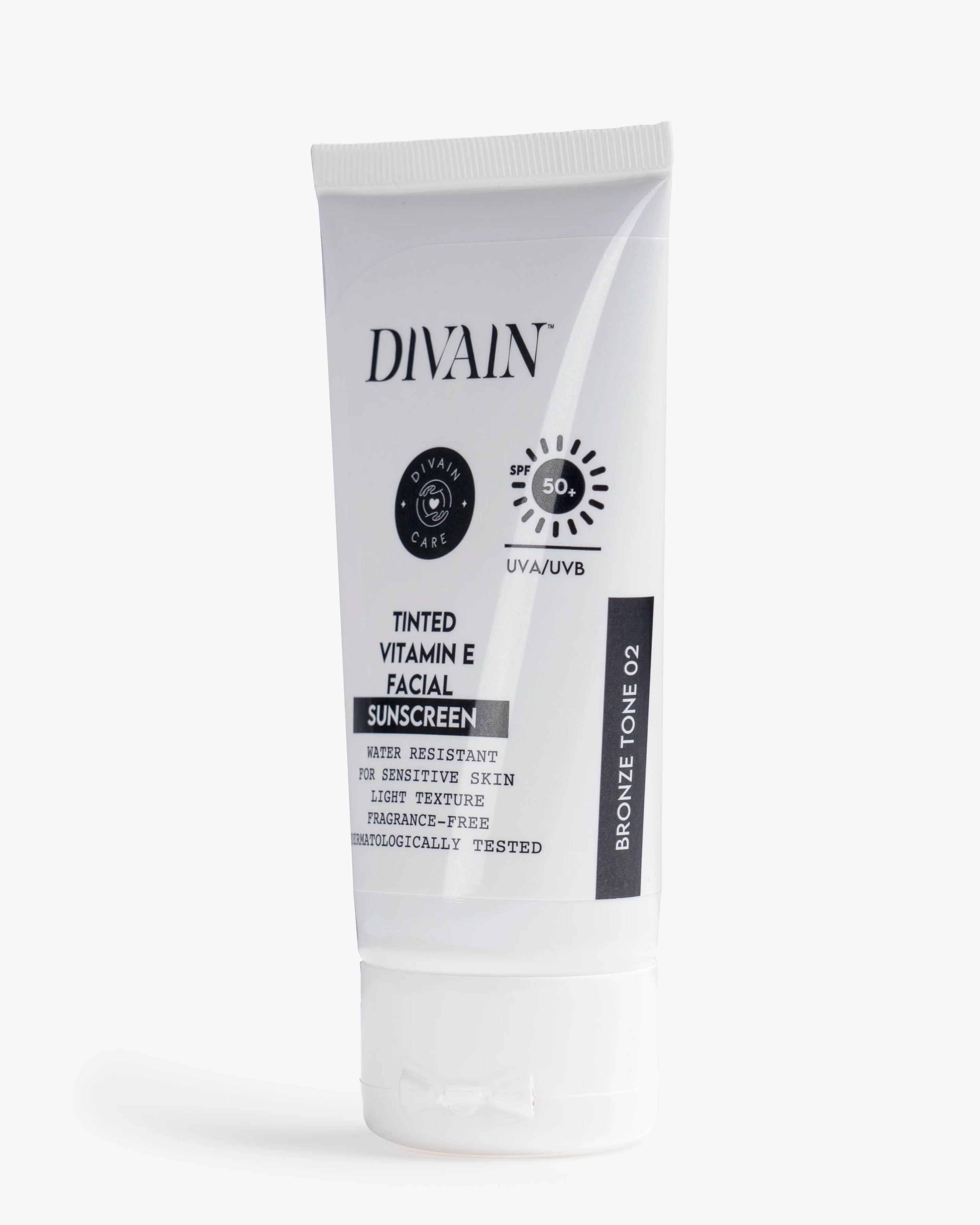 Divain Care 50ml bottle of dark tinted facial sunscreen with dark tint