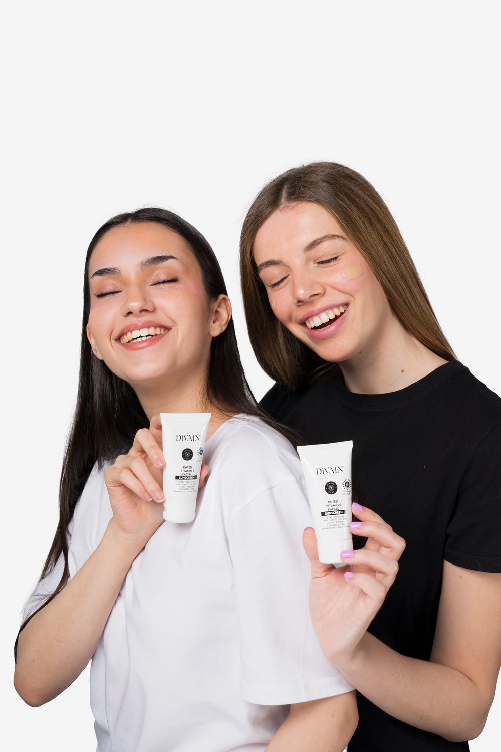 Two models showing the facial creams