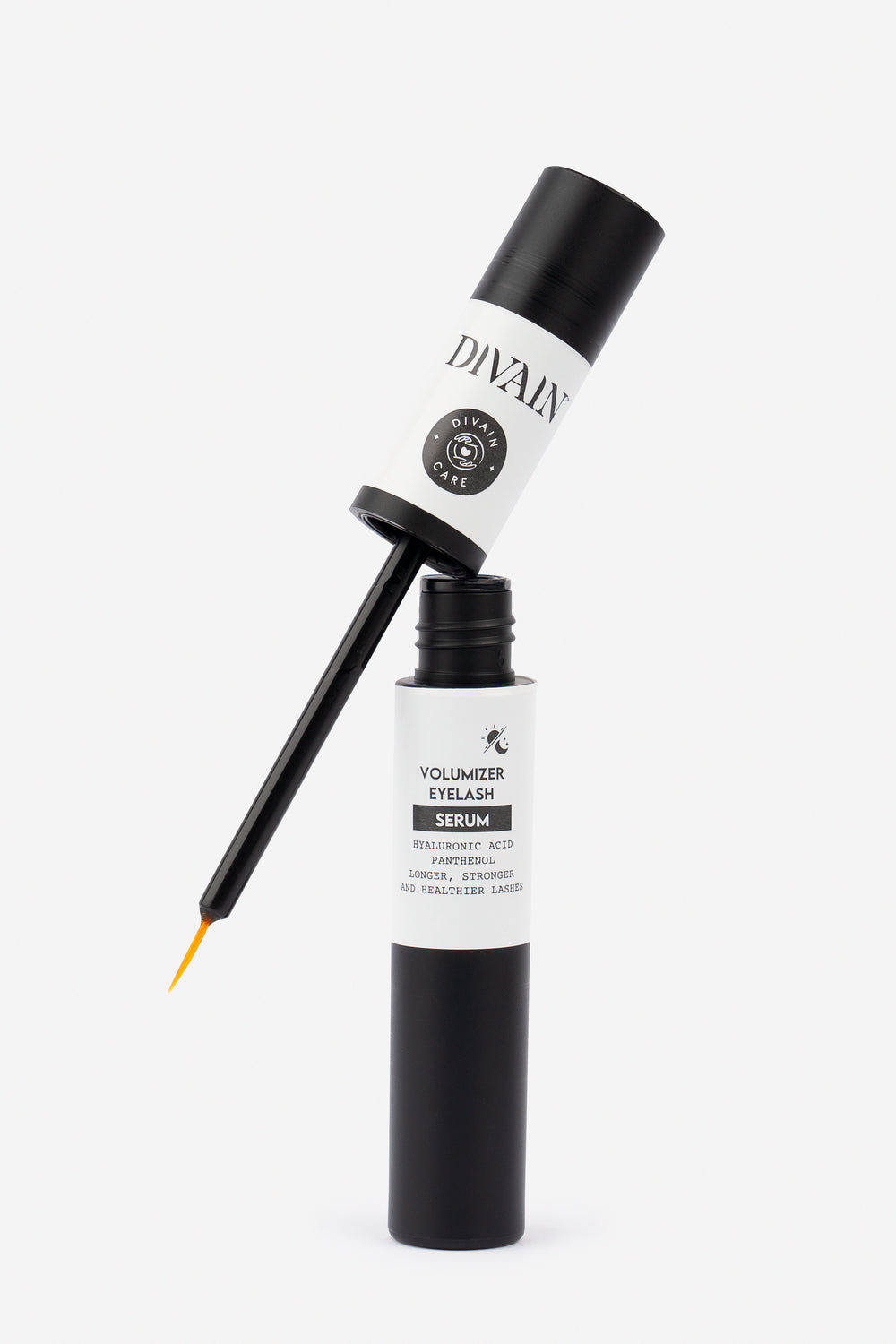 Open bottle of divain care eyelash serum 3 ml.