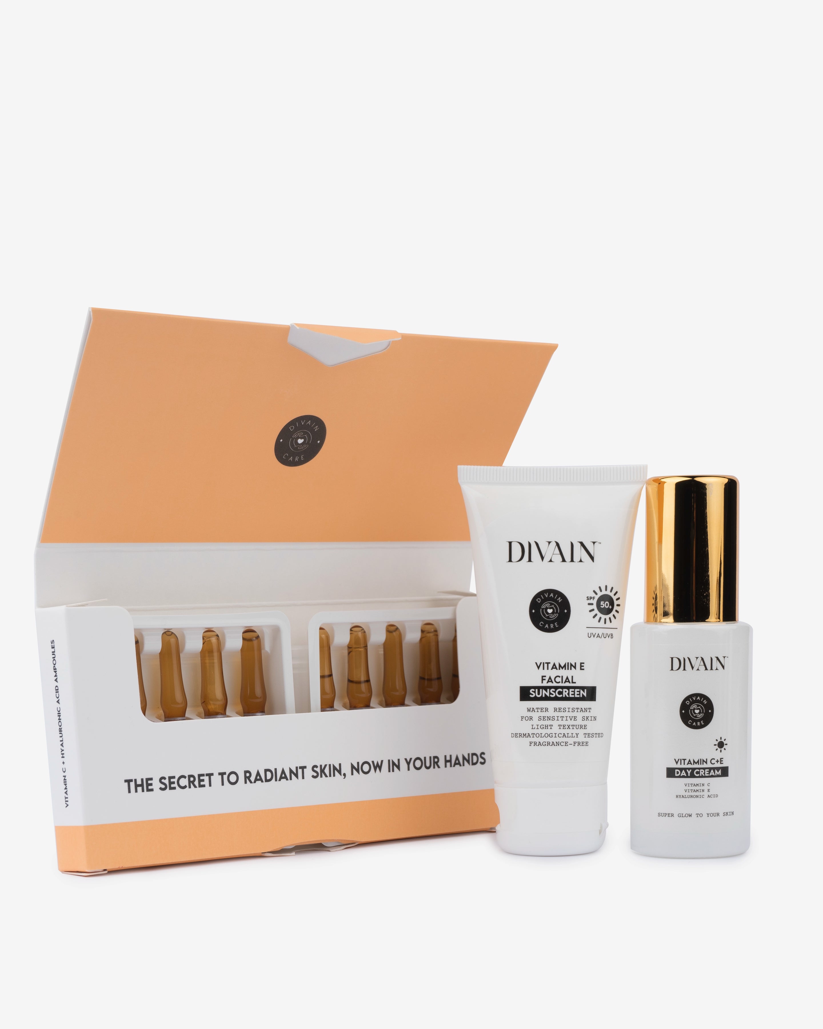 Anti-spot treatment pack containing facial ampoules, a moisturising cream and a facial sunscreen.